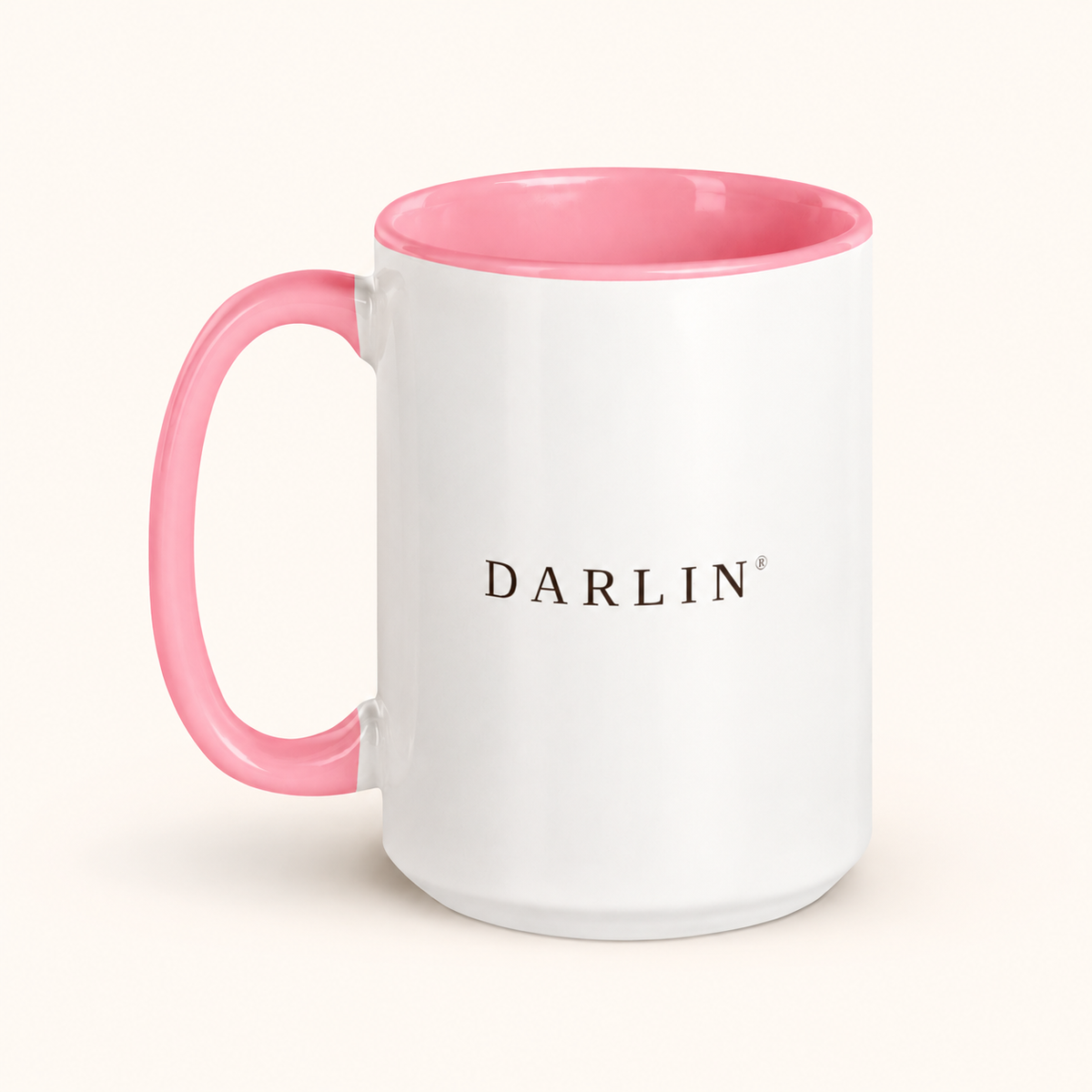 GOOD MORNING, DARLIN® 15 oz ceramic mug with pink interior and handle on a warm ivory background.