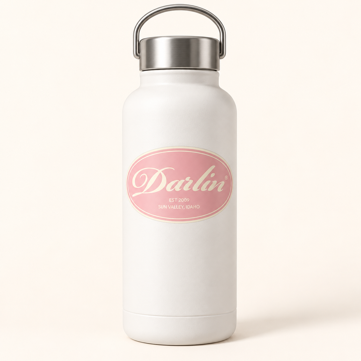 DARLIN® Cream Heritage Oval sticker displayed on a white insulated water bottle against a Warm Ivory backdrop.