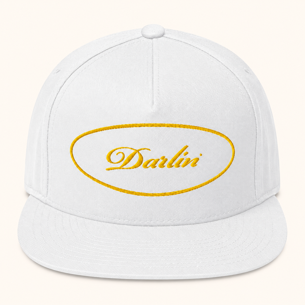 DARLIN® Gold Oval Snapback Hat in white with gold script embroidery – front view