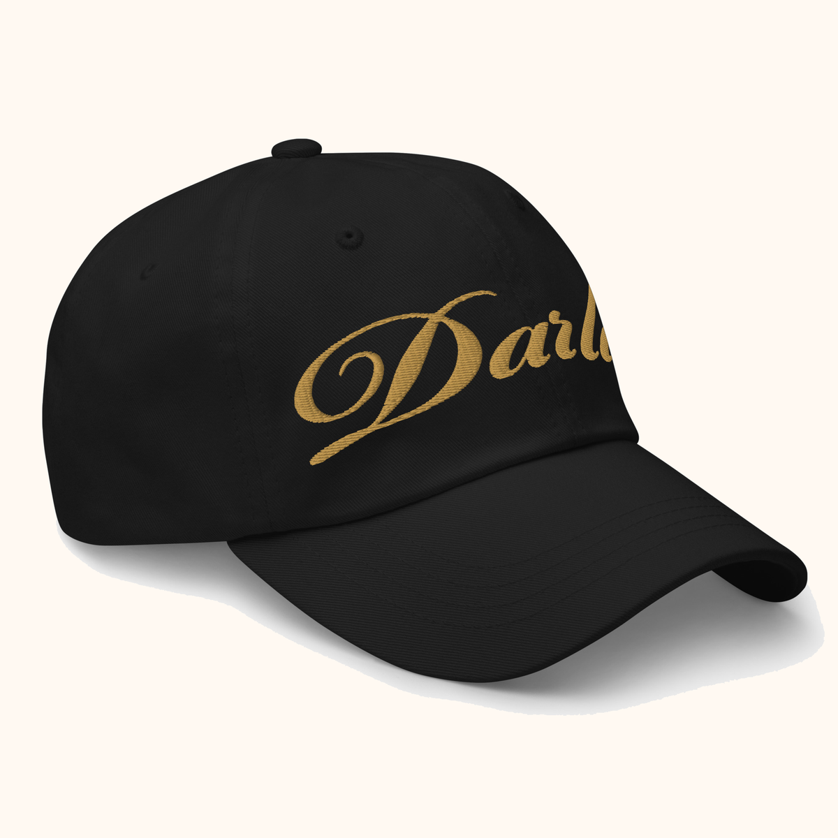 DARLIN® Original Script Black Hat with Old Gold embroidery – angled view