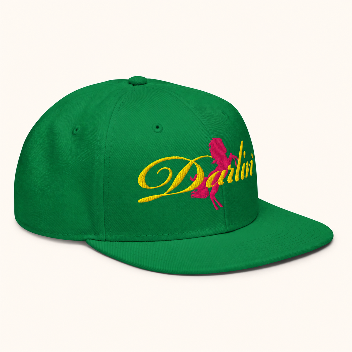 DARLIN® Ride Snapback Hat in Kelly Green with yellow script and pink pony embroidery – angled view