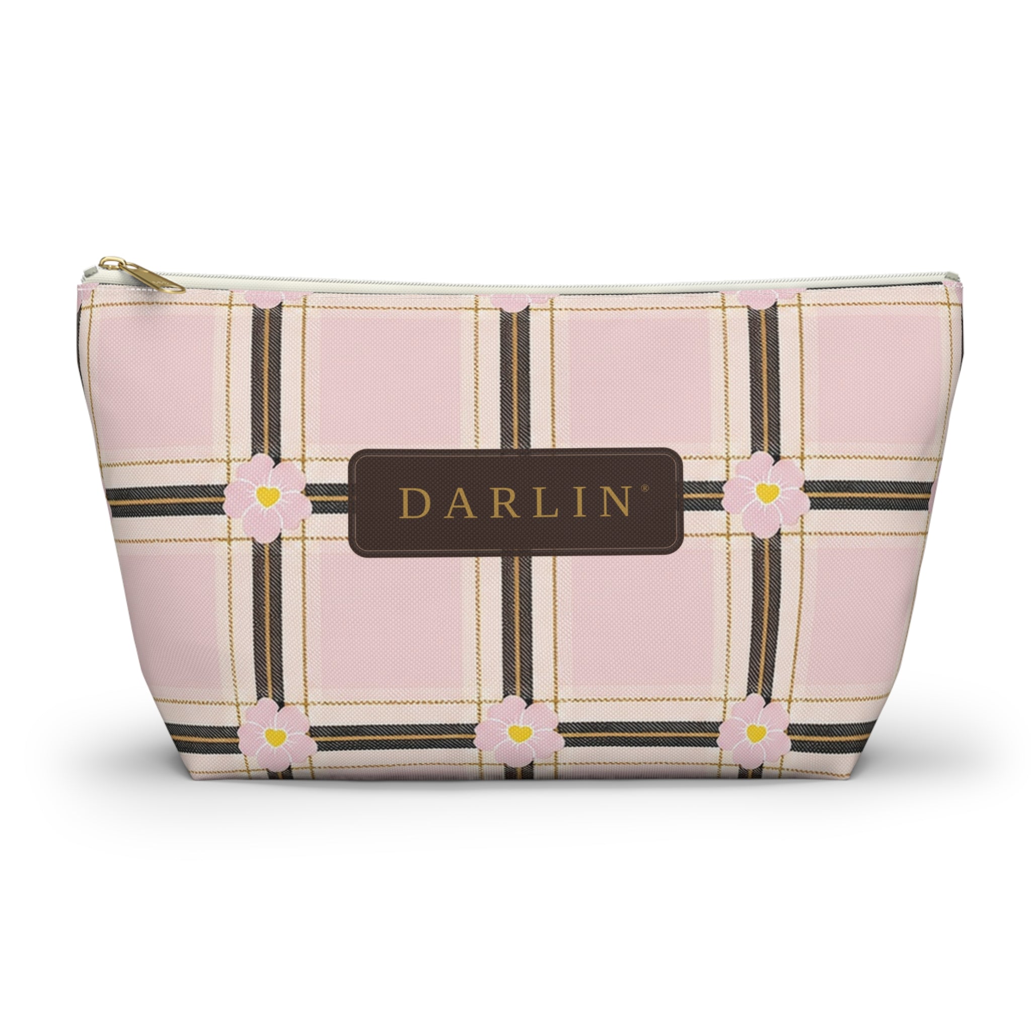 DARLIN® Primrose Plaid Travel Pouch in pink, cream, black and antique gold with primrose flowers and chocolate-and-gold DARLIN® emblem.