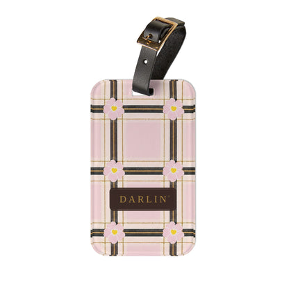 DARLIN® Primrose Plaid luggage tag with pink and cream plaid, primrose flowers and chocolate-and-gold DARLIN® emblem
