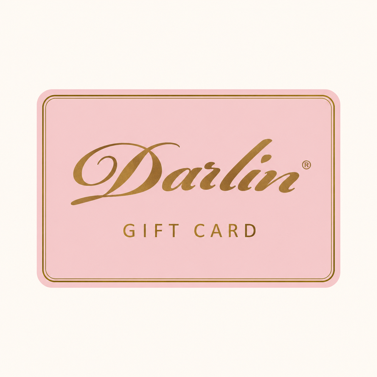 DARLIN® Gift Card with gold script lettering and a double gold border on a soft pink card against warm ivory.